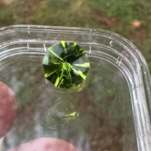 Custom cut genuine VS peridot in gem jar